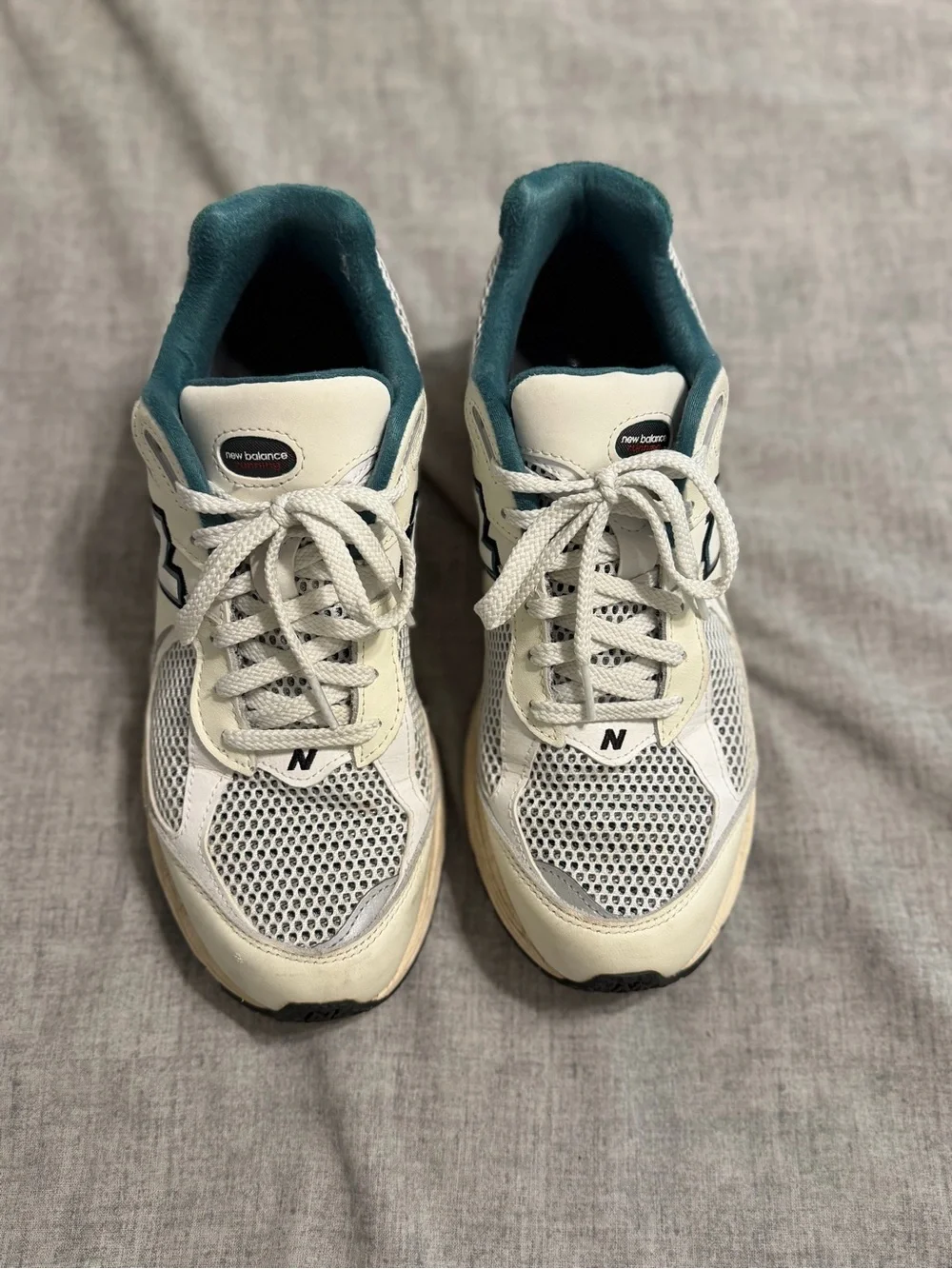 New Balance White Sneakers with Teal Lining and Navy Accents